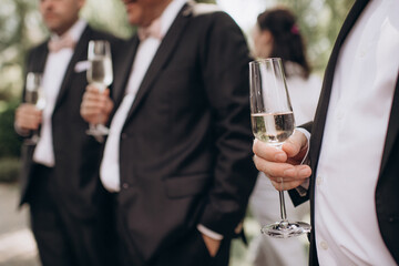 people with glasses of alcohol at a banquet