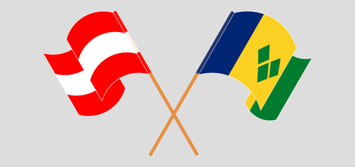 Crossed flags of Austria and Saint Vincent and the Grenadines. Official colors. Correct proportion