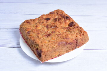 Fluffy bread cake with guava flavor on wooden background