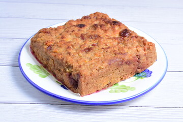 Fluffy bread cake with guava flavor on wooden background
