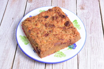 Fluffy bread cake with guava flavor on wooden background