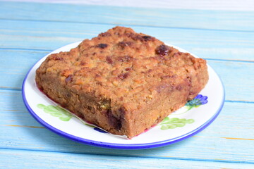 Fluffy bread cake with guava flavor on wooden background