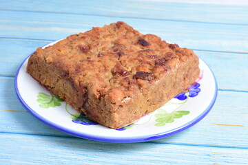 Fluffy bread cake with guava flavor on wooden background