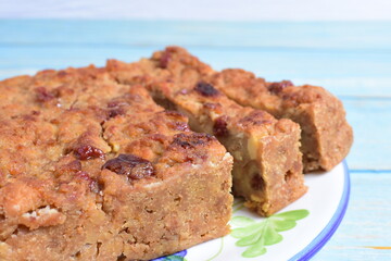 Fluffy bread cake with guava flavor on wooden background