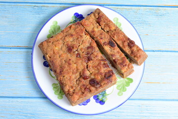 Fluffy bread cake with guava flavor on wooden background