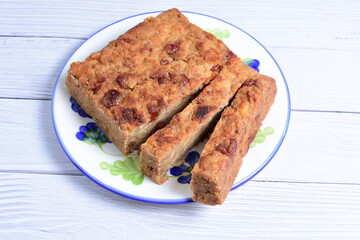 Fluffy bread cake with guava flavor on wooden background