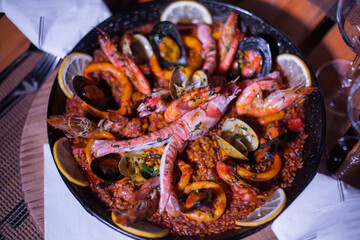 Fresh Paella dish on the table