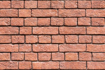 Old brick wall of red color. Background