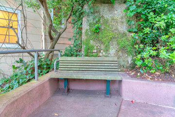 Old bench near the metal railings at San Francisco, California