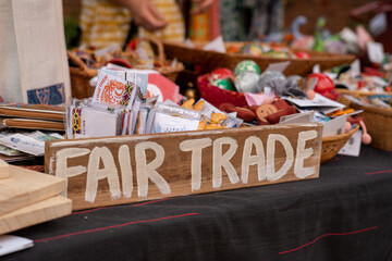 wooden fair trade sign at markets
