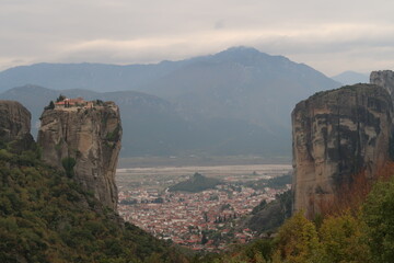 View between rocks onto Kalambaka, Monastery of the Holy Trinity in the front