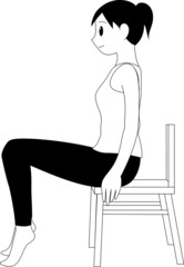 椅子に座ってかかとを上げる女性（モノクロ）