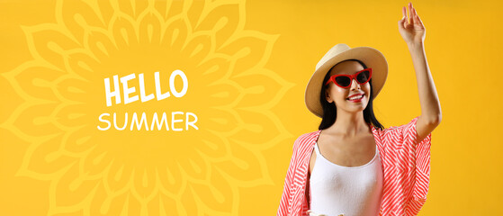 Beautiful young woman in beachwear on yellow background. Hello summer