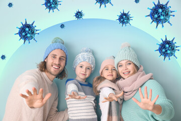 Healthy family with strong immunity on blue background. Protection against viruses - obrazy, fototapety, plakaty