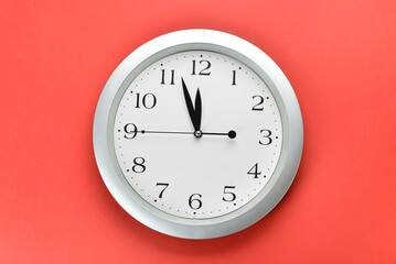 New modern clock on red background