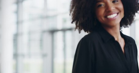 Portrait of a happy young business woman of african ethnicity employee worker looking at camera showing thumbs up gesture in her company office