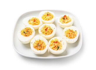 Plate with tasty stuffed eggs on white background. Easter celebration