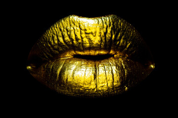 Gold, sexy female golden lips. Sensual lips, sexy mouth.