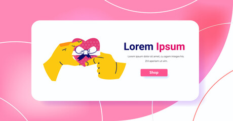 hands holding gift box in heart shape international happy womens day holiday celebration concept greeting card