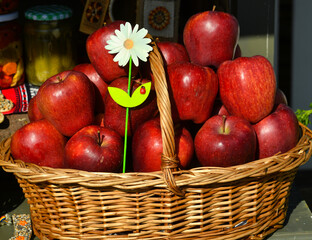 Basket with red apples. Apple detail.