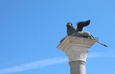 Bronze statue of a winged lion which is the symbol of the island of Venice and of the republic called LA SERENISSIMA in the Veneto Region in Northern Italy