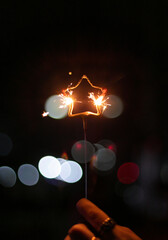 Hand-held pentagram fireworks stick night