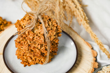 The oatmeal cookies selective focus close up or healthy cereal oat crackers. Crispy anzac biscuit...