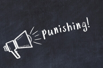 Chalk loudspeaker and inscription punishing on black chalkboard