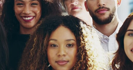 Group of young and diverse business men and business women standing together in their workplace. Diverse business friends 