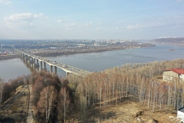 A large transport bridge over the river. Traffic on the bridge of cars. High quality FullHD footage