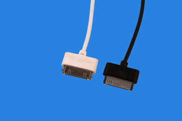 Black and white USB ports. Isolated on a blue background.