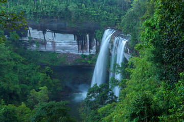 Fototapeta na wymiar Beautiful waterfall in the deep forest at Thailand.