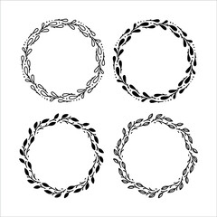Set of 4 hand drawn spring wreaths isolated on white background, vector. Outline and silhouette frames of leaves. Doodle style.Collection of floral monogram frames.