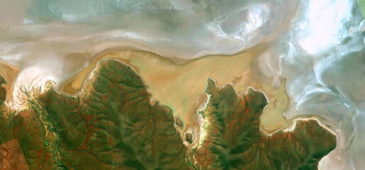 abstract landscape of the deserts of Africa from the air emulating the shapes and colors of the...