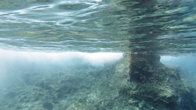 Crystal Clear Underwater Shot Of Paralia Emplise Beach During The Day, In Greece