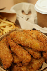 Concept of tasty food with chicken strips, close up