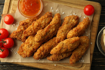 Concept of tasty food with chicken strips, top view