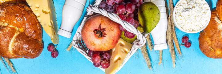 Happy Shavuot greeting card background with food Symbols of jewish Shavuot holiday - pomegranate,...