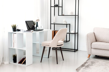 Comfortable and cozy workplace with laptop at home.