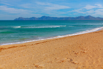 Playa del Muro Beach . Alcudia Bay with sandy coast . Balearic Sea and beach of Mallorca islands in Spain 