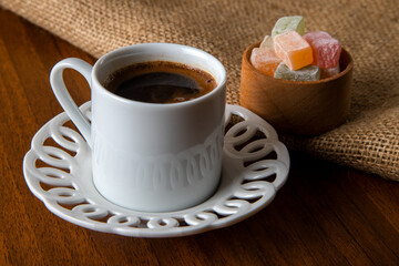 Traditional Turkish delight and Turkish coffee on a wooden background,top view	