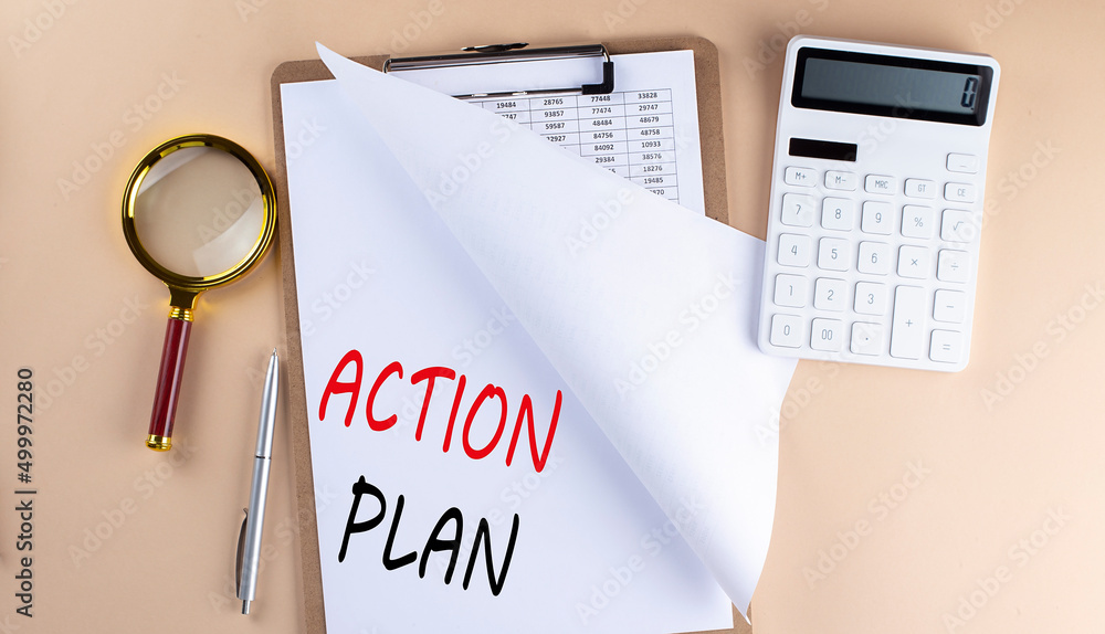 Aufkleber clipboard with chart and text action plan with magnifier ,calculator on beige background