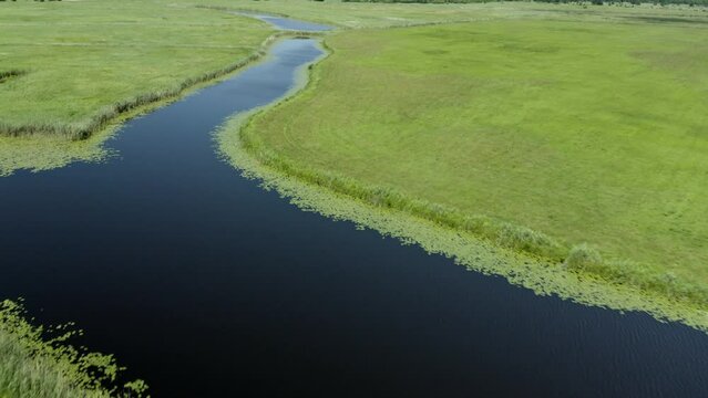 Drone shot of Lithuanian meadows at Rusnė city. &Scaron;ilutė. 4K 25fps