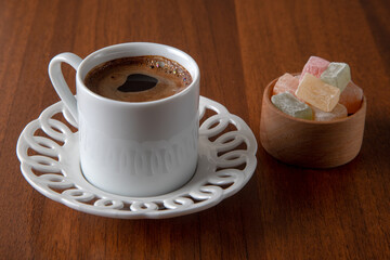 Traditional Turkish delight and Turkish coffee on a wooden background,top view	