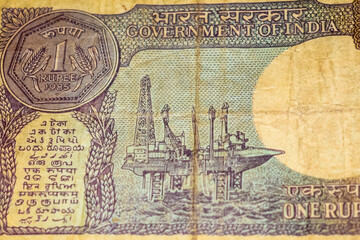 Fototapeta premium Old One Rupee notes combined on the table, India money on the rotating table. Old Indian Currency notes on a rotating table, Indian Currency on the table