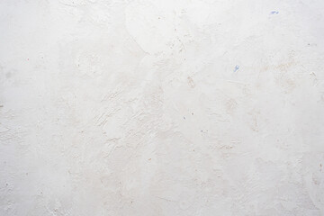 artistic plaster on a gray and white wall. Repairs. elements of wall decor. copy space. texture. background.