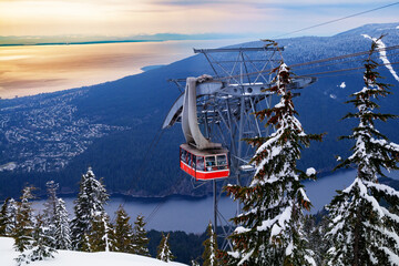 Lift gondola over Vancouver and Capilano lake from Grouse Grind