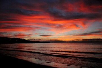 Fototapeta na wymiar red sunset on the beach