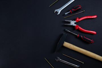 A set of hand tools for repair top view on a solid background.
