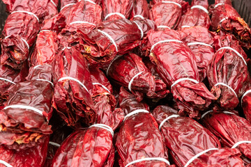 Close up shot of a bunch of dried chilli pepper in sunlight